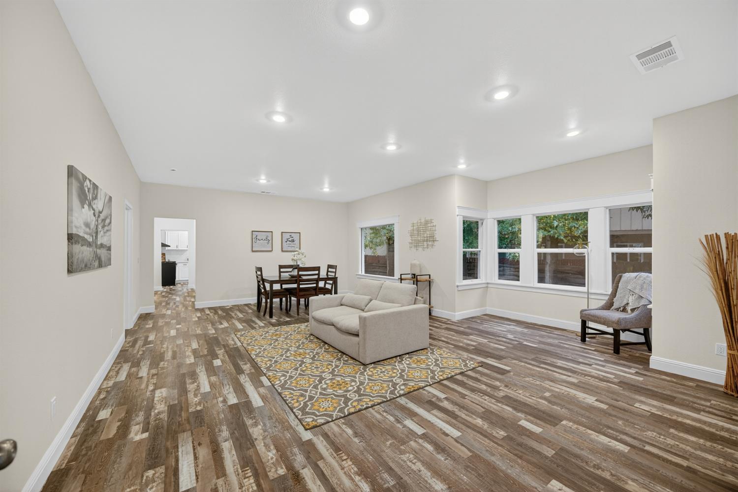 400 Pacific Lodi, CA 95242 - Photo 5 of 50 a living room with furniture and a wooden floor