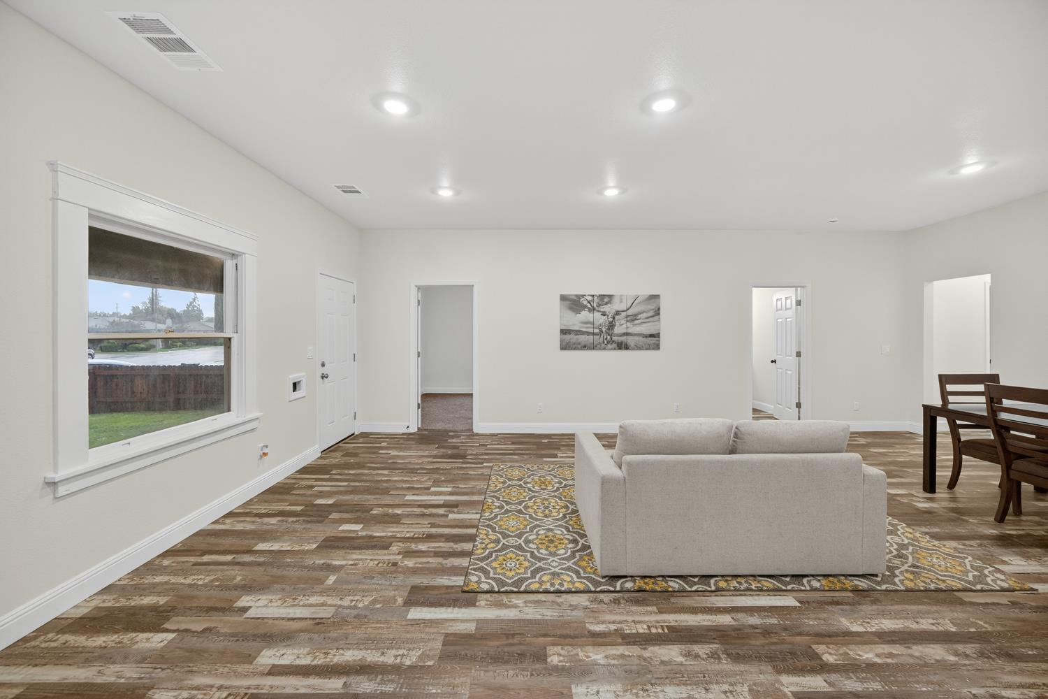 400 Pacific Lodi, CA 95242 - Photo 8 of 50 a living room with furniture and a large window