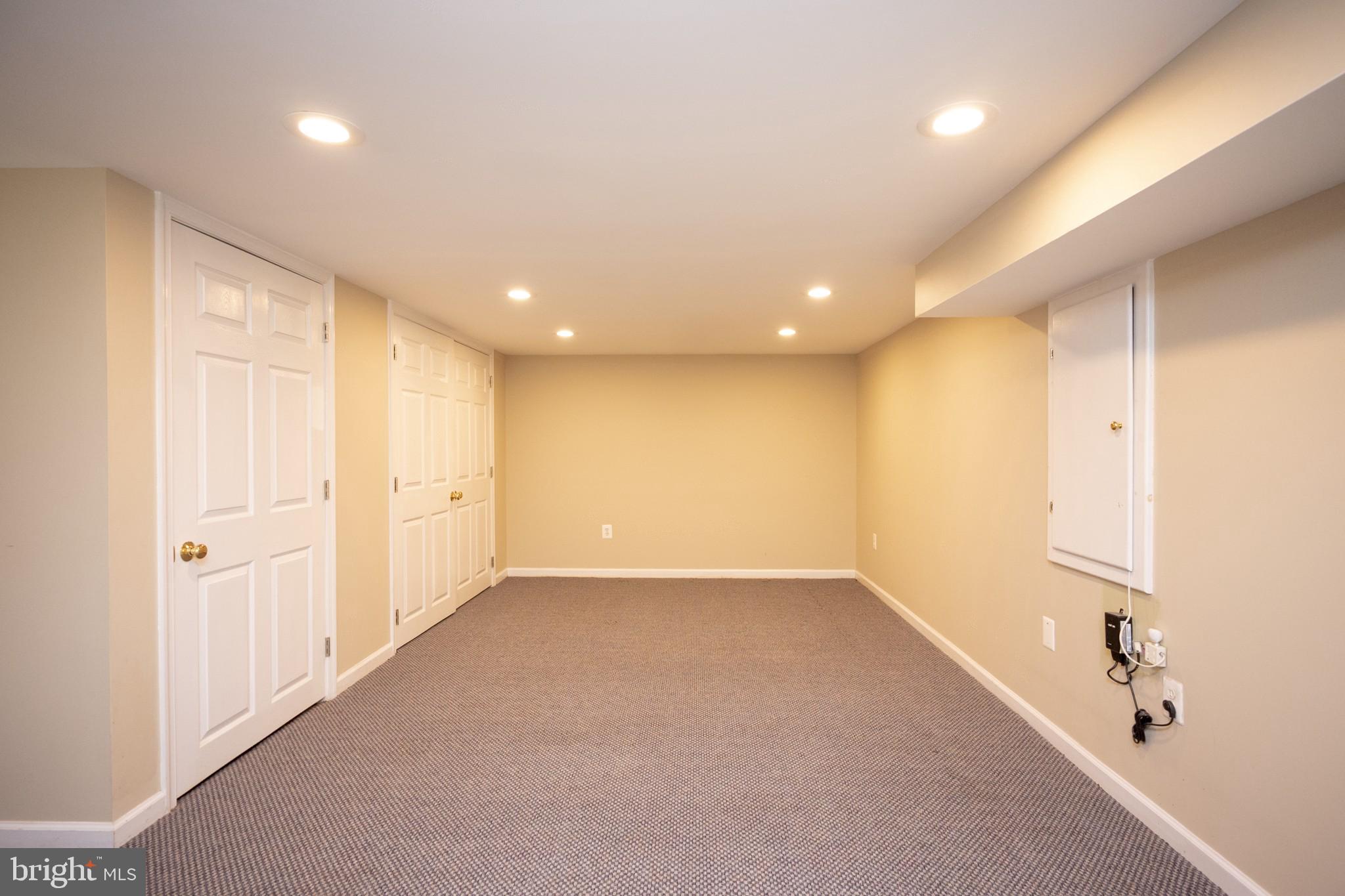 2104 Steuben Way Silver Spring, MD 20905 - Photo 12 of 25 an empty room with cabinet and windows