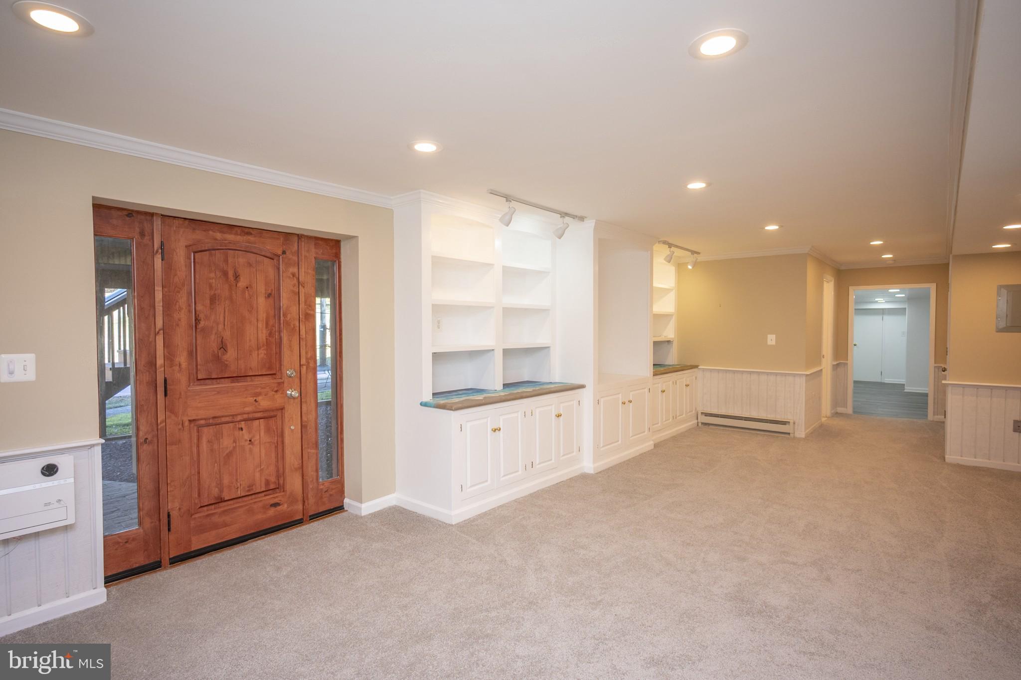 2104 Steuben Way Silver Spring, MD 20905 - Photo 9 of 25 a view of an empty room with a kitchen