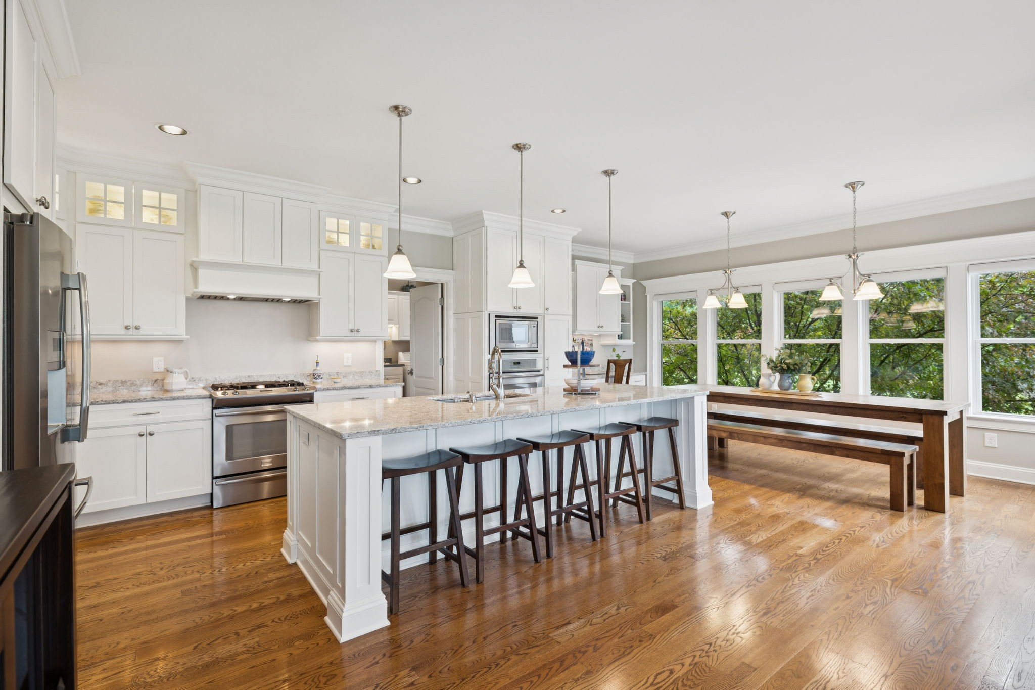 1731 Hudson Road Madison, TN 37115 - Photo 14 of 75 a kitchen with stainless steel appliances granite countertop a stove and a wooden floors