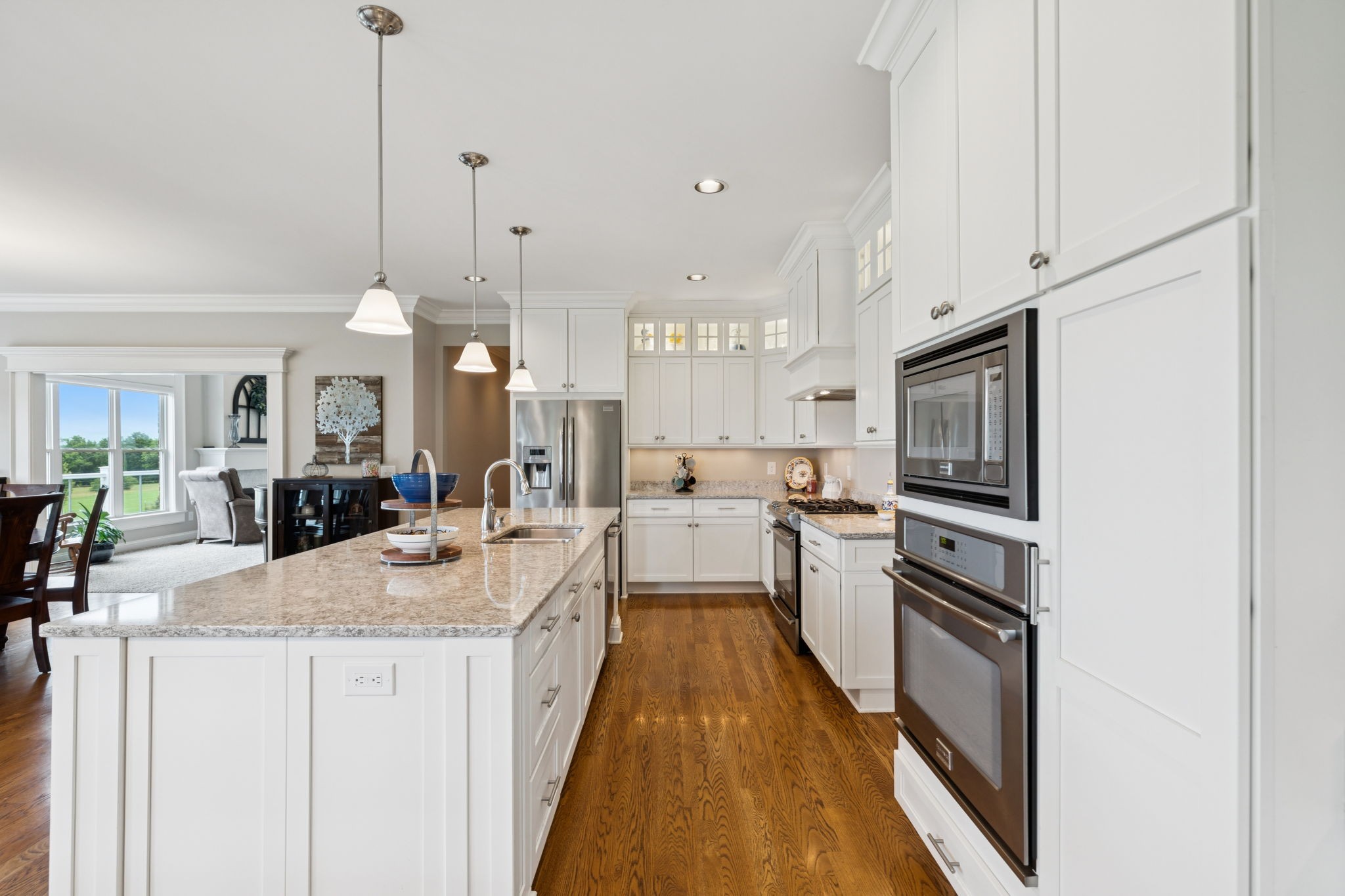 1731 Hudson Road Madison, TN 37115 - Photo 17 of 75 a large kitchen with kitchen island a large counter top space a sink stainless steel appliances and cabinets