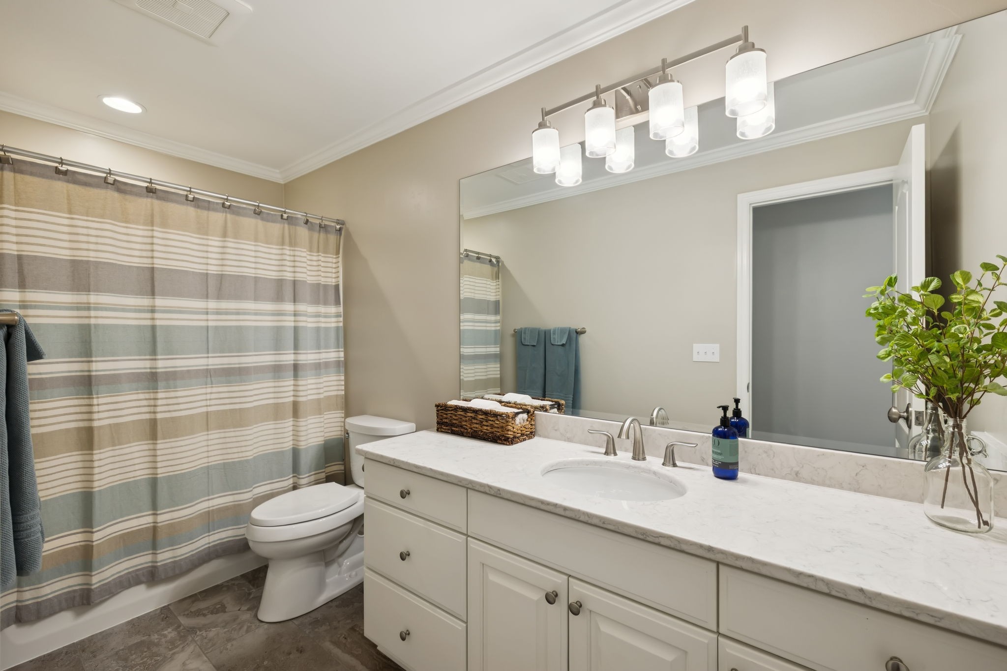 1731 Hudson Road Madison, TN 37115 - Photo 50 of 75 a bathroom with a sink a toilet and shower