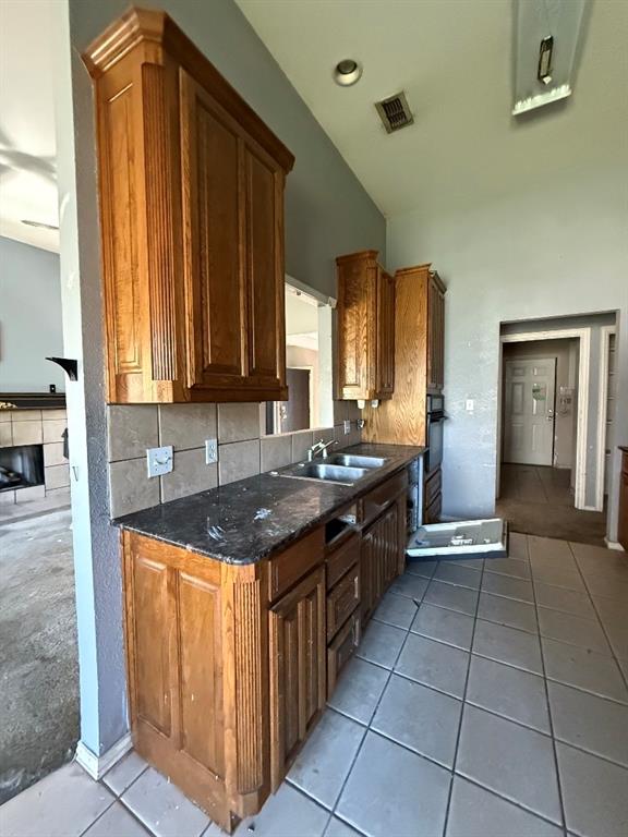 5424 Appalachian Way Fort Worth, TX 76123 - Photo 5 of 16 a kitchen with a sink a counter top space and cabinets