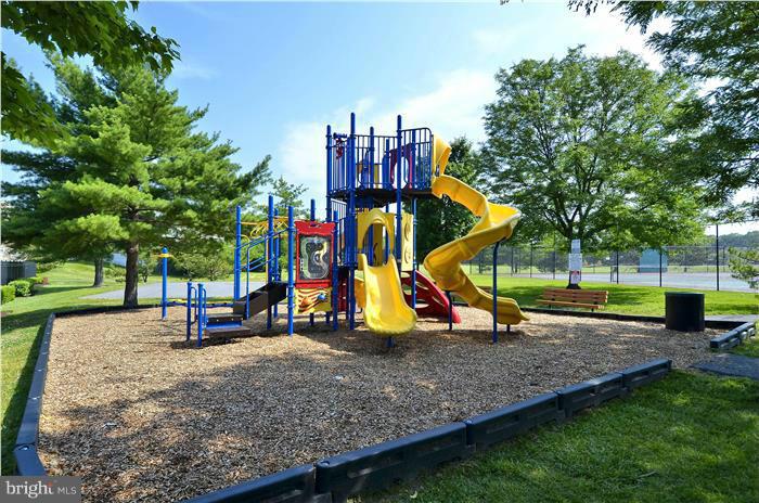 14201 Woolen Oak Court, Unit 432 Silver Spring, MD 20906 - Photo 18 of 20 a view of outdoor space with playground and green space