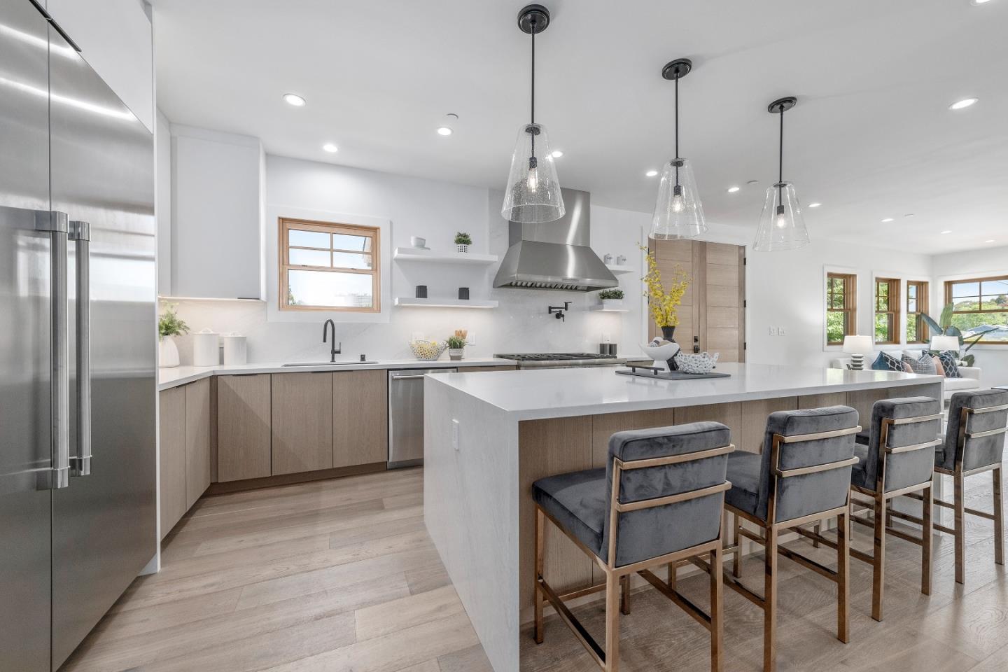 1151 Rosedale Avenue Burlingame, CA 94010 - Photo 12 of 38 a kitchen with cabinets a sink stainless steel appliances and a window