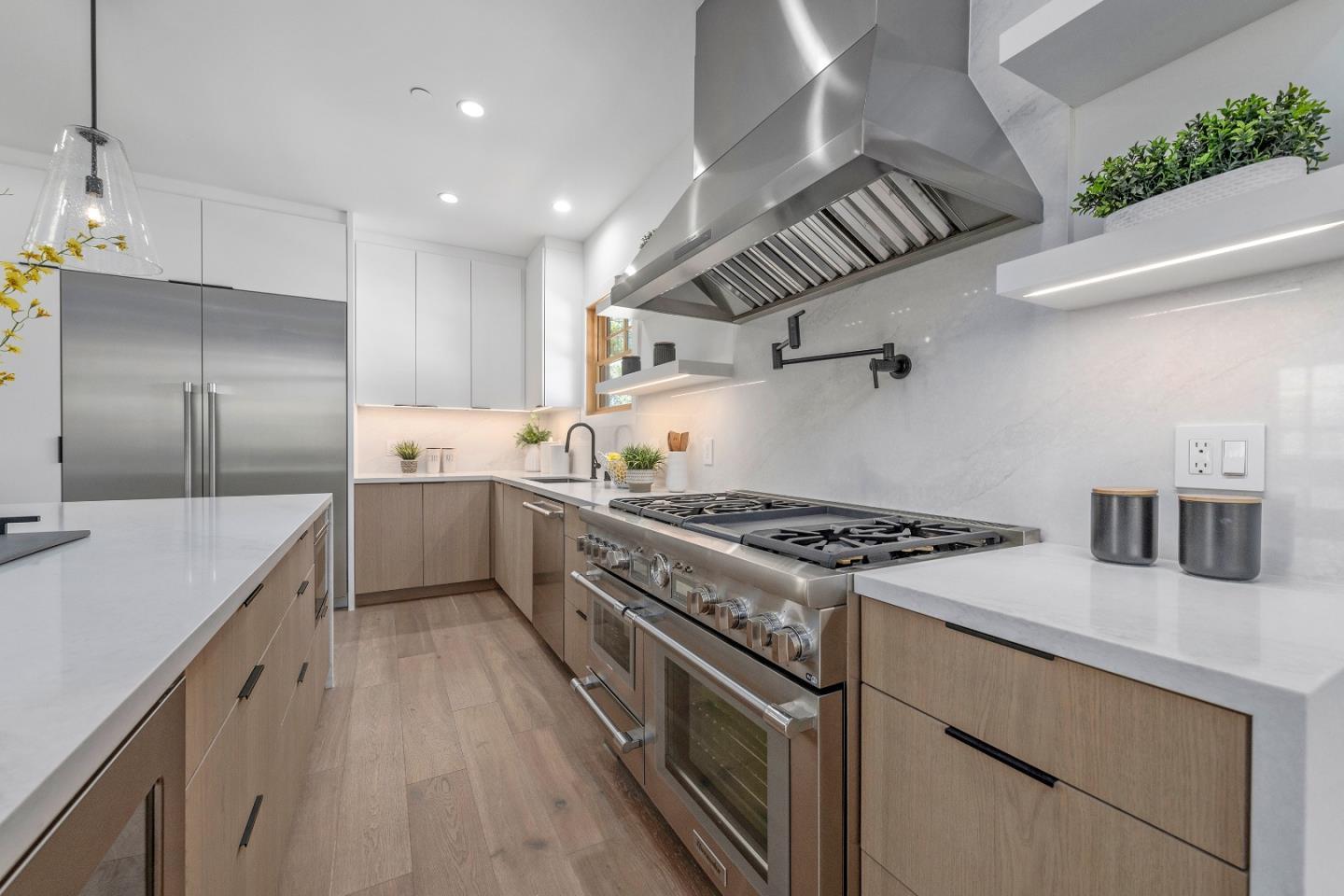 1151 Rosedale Avenue Burlingame, CA 94010 - Photo 14 of 38 a kitchen with stainless steel appliances granite countertop a stove and a refrigerator