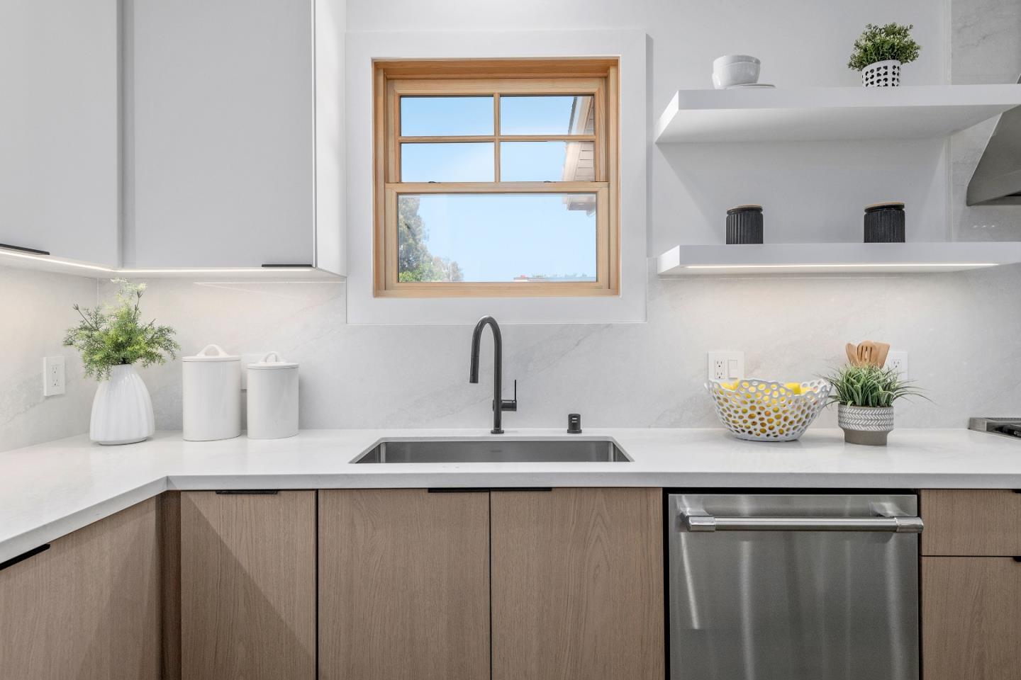 1151 Rosedale Avenue Burlingame, CA 94010 - Photo 16 of 38 a kitchen with a sink and cabinets