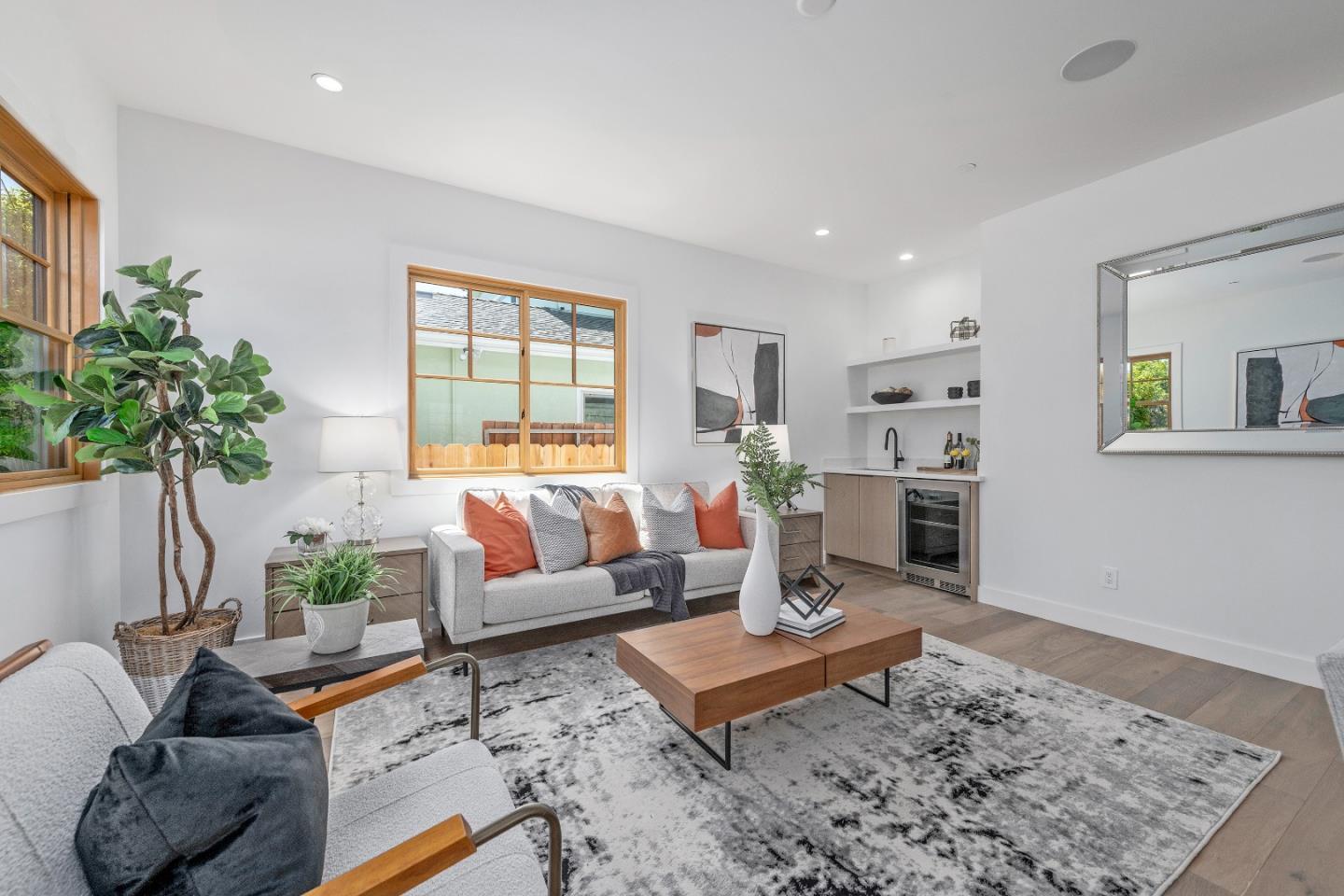 1151 Rosedale Avenue Burlingame, CA 94010 - Photo 17 of 38 a living room with furniture rug and a potted plant