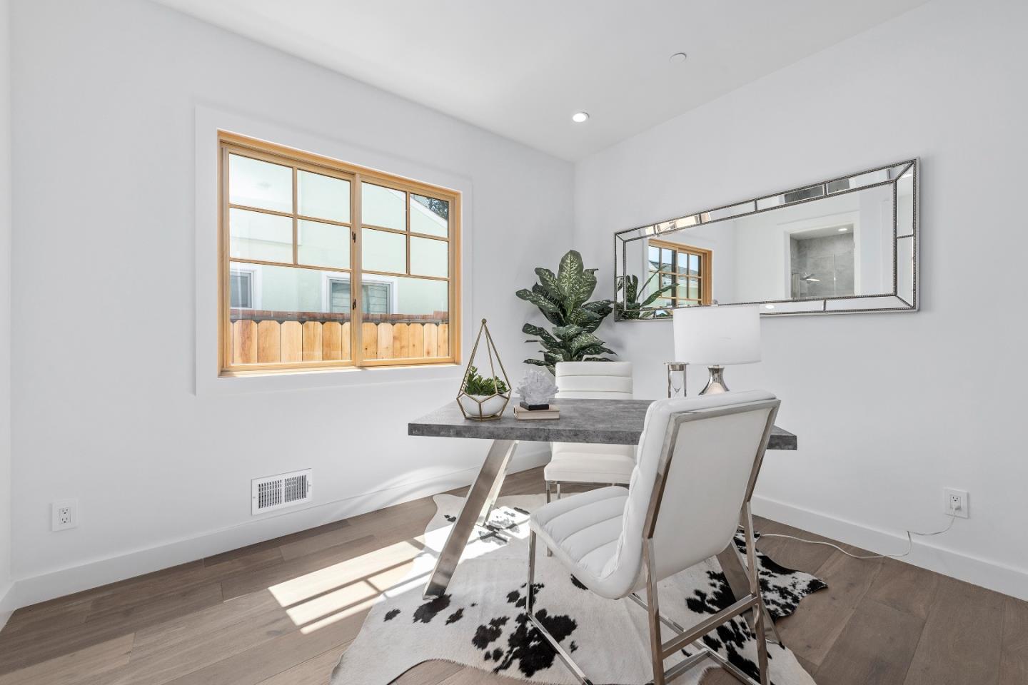 1151 Rosedale Avenue Burlingame, CA 94010 - Photo 20 of 38 a workspace with furniture and a window