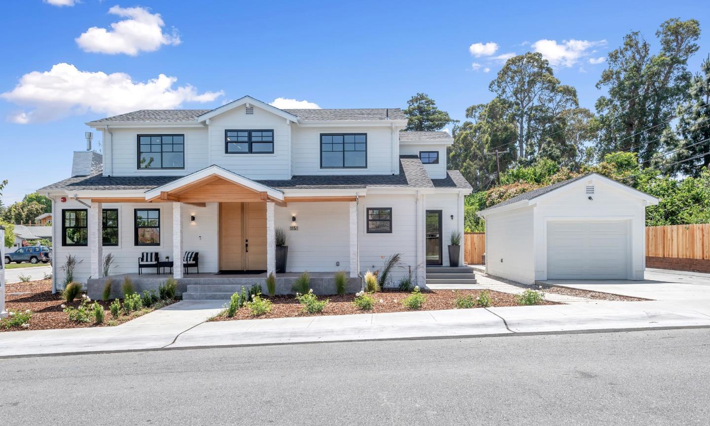 1151 Rosedale Avenue Burlingame, CA 94010 - Photo 2 of 38 a front view of a house with a yard and potted plants