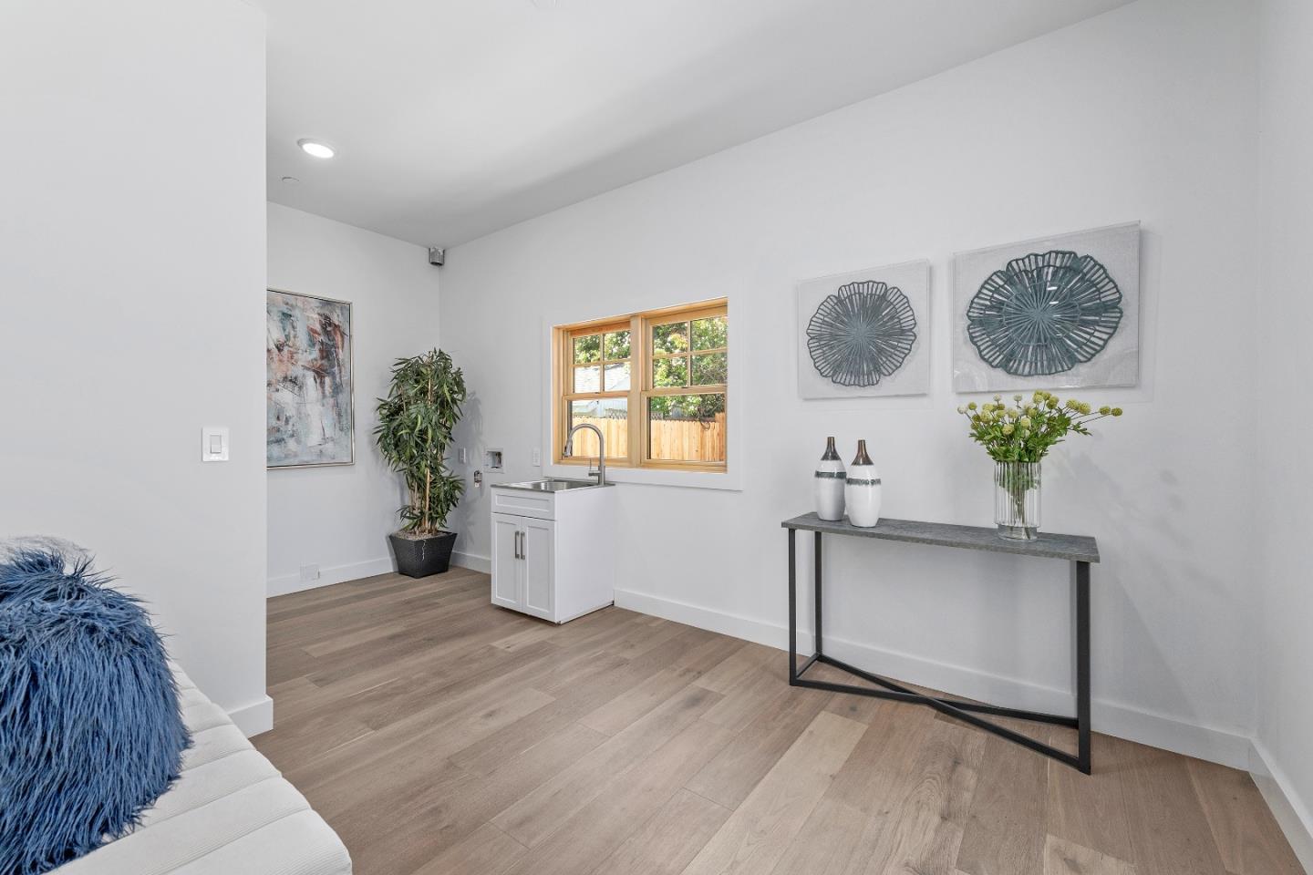 1151 Rosedale Avenue Burlingame, CA 94010 - Photo 21 of 38 a living room with furniture and a window