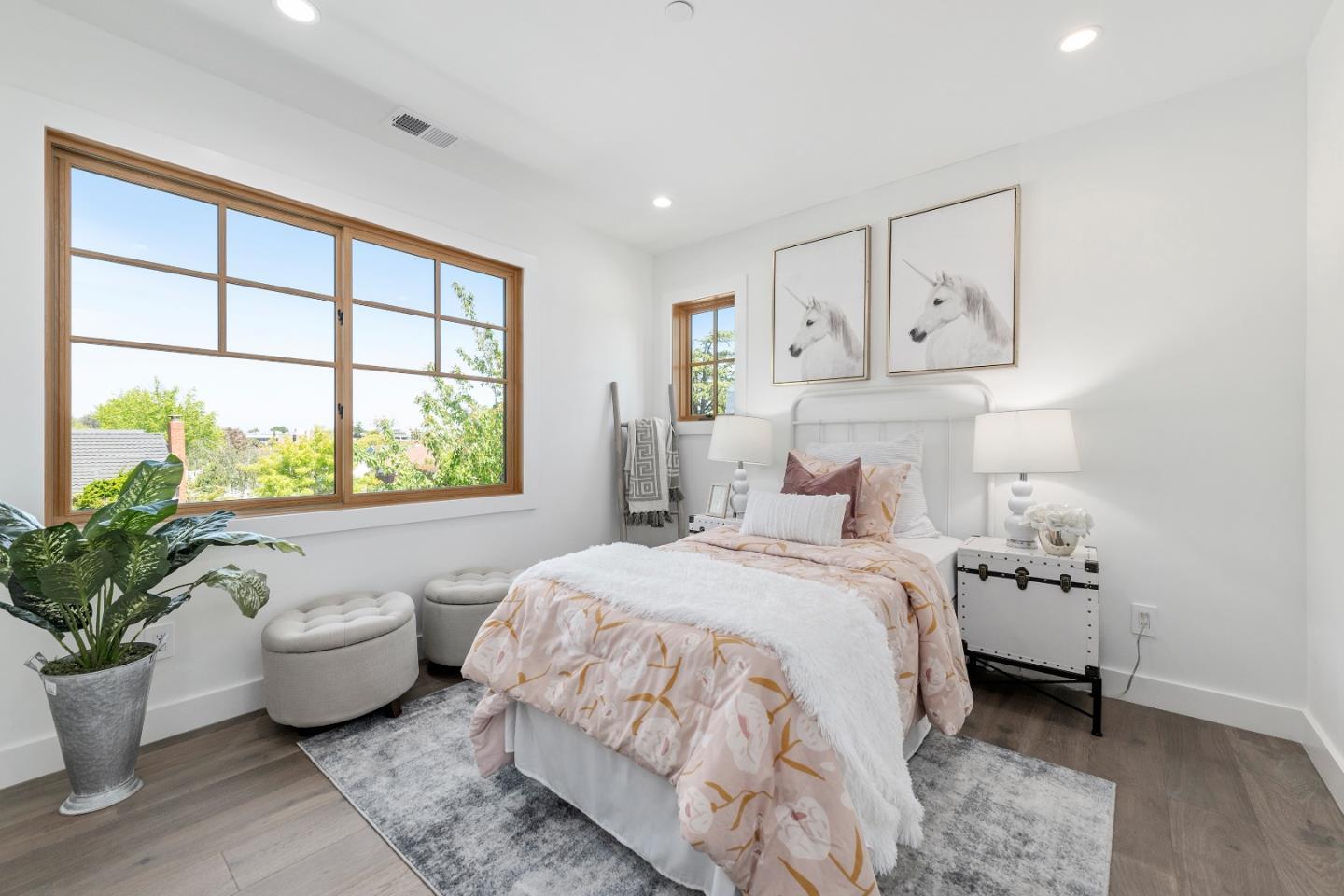 1151 Rosedale Avenue Burlingame, CA 94010 - Photo 25 of 38 a spacious bedroom with a bed and a large window