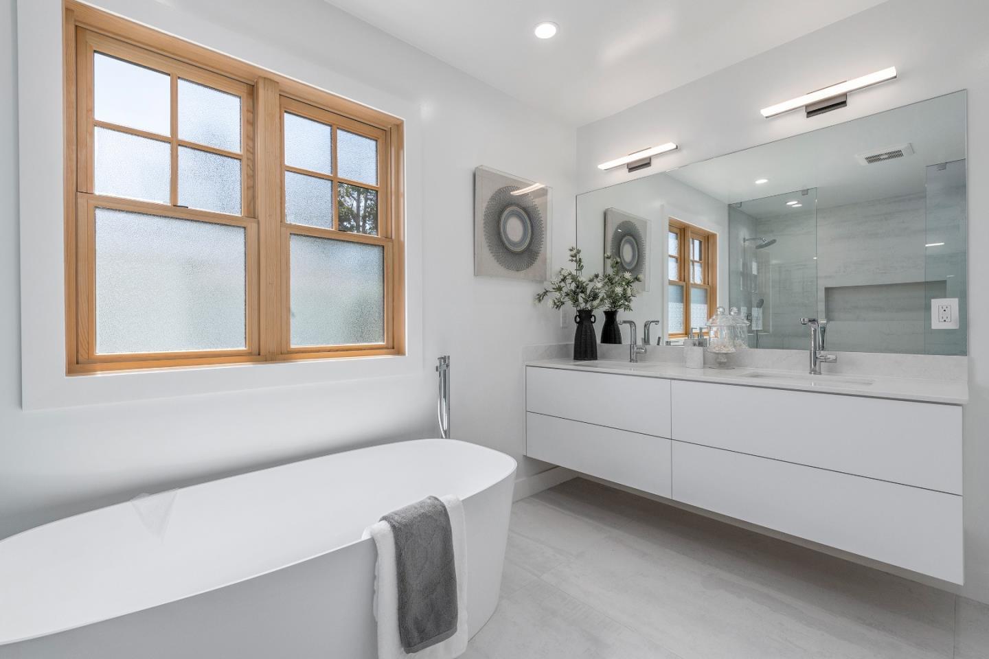 1151 Rosedale Avenue Burlingame, CA 94010 - Photo 31 of 38 a bathroom with a sink a toilet and a mirror
