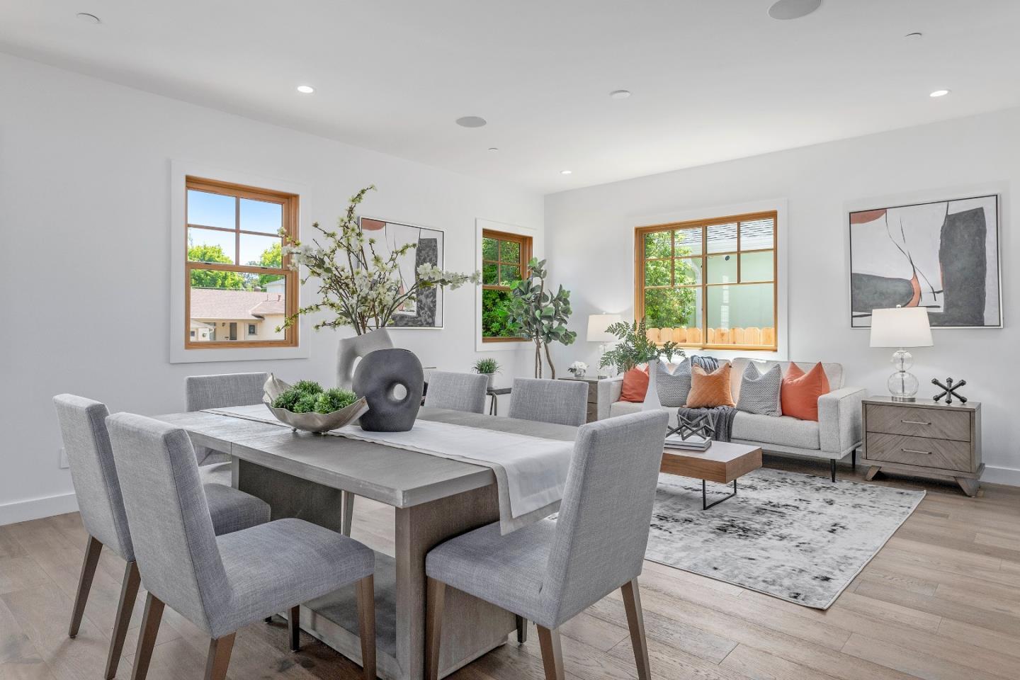 1151 Rosedale Avenue Burlingame, CA 94010 - Photo 10 of 38 a view of a dining room with furniture a couch and wooden floor