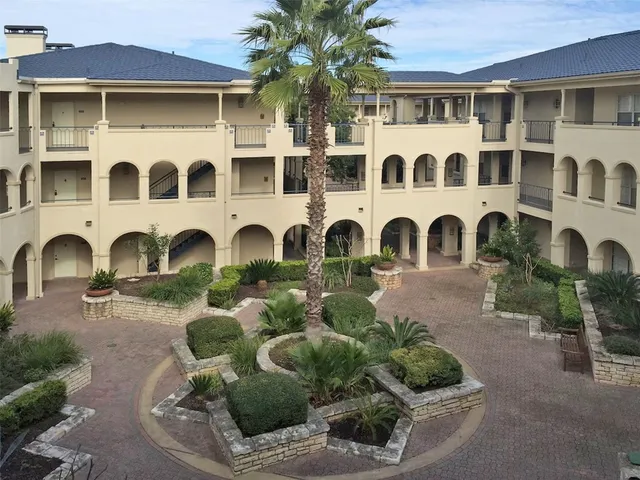 a front view of a multi story residential apartment building