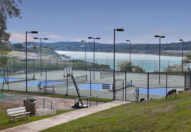 a view of a swimming pool with a chair