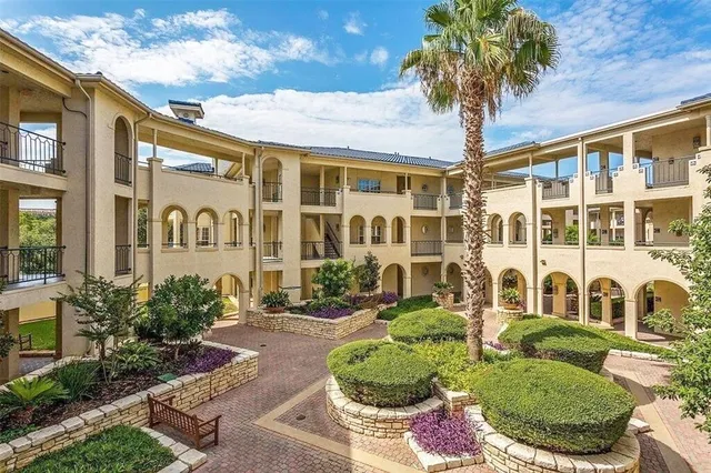 a front view of a multi story residential apartment building