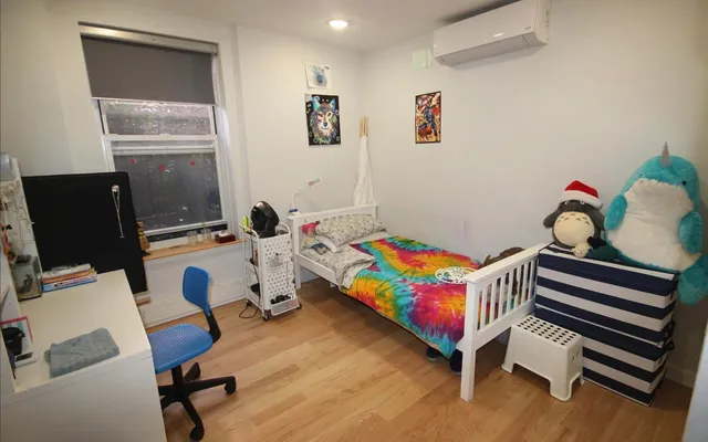 a room with furniture and a window