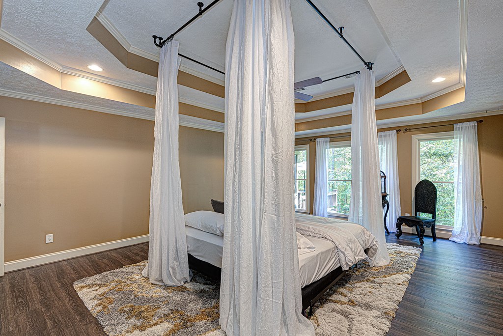 40 Maple Court Midland, GA 31820 - Photo 12 of 38 Master bedroom with floor to ceiling windows