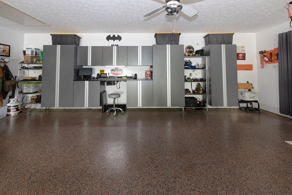 40 Maple Court Midland, GA 31820 - Photo 22 of 38 Epoxy floored garage with heavy duty cabinetry