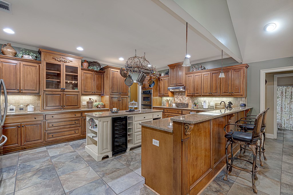 40 Maple Court Midland, GA 31820 - Photo 3 of 38 Kitchen island and breakfast bar