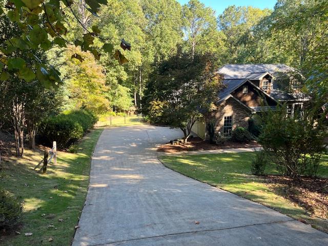 40 Maple Court Midland, GA 31820 - Photo 35 of 38 Driveway to side entry garage & turnaround area