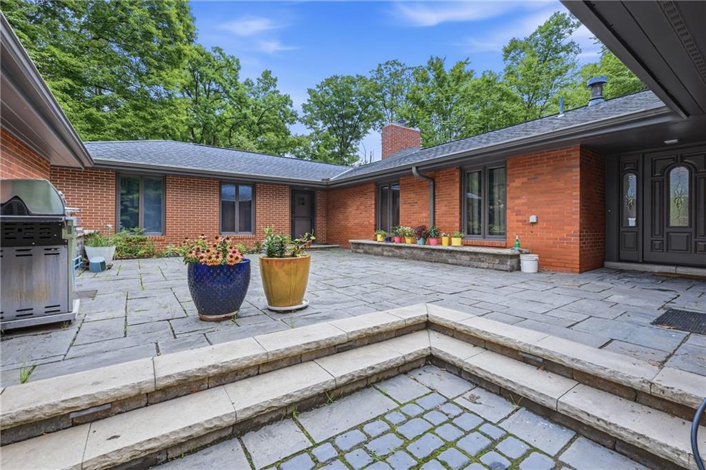 801 Koonce Road Hermitage, PA 16148 - Photo 5 of 35 Beautiful and unique courtyard is so impressive and makes a great space for entertaining.