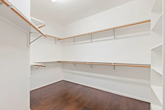 a view of an empty walk in closet