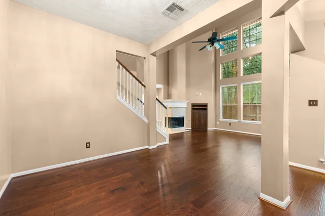 a view of an entryway with wooden floor