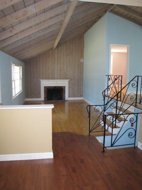 51 Lawrence Road Dennis Port, MA 02639 - Photo 3 of 17 a living room with furniture and a fireplace
