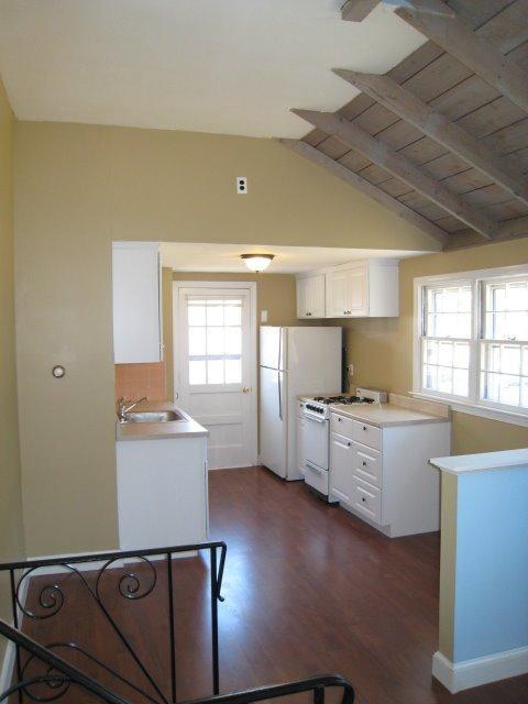 51 Lawrence Road Dennis Port, MA 02639 - Photo 5 of 17 a kitchen with sink cabinets and window