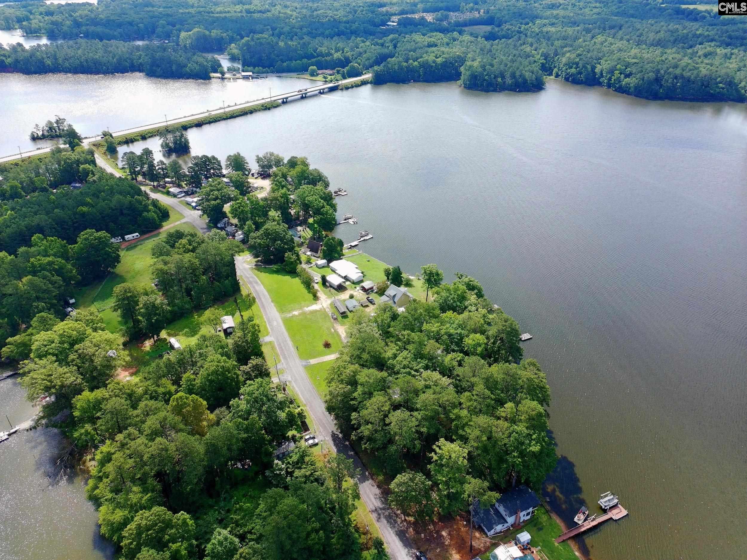 1175 Tailers Trail Prosperity, SC 29127 - Photo 3 of 16 an aerial view of a house with a yard and lake view