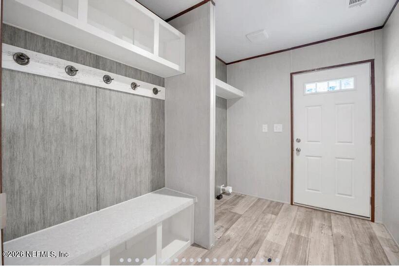 140 Islander Road Satsuma, FL 32189 - Photo 10 of 11 a bathroom with a sink and a mirror