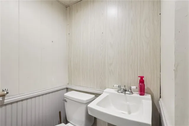 a bathroom with a sink and a toilet