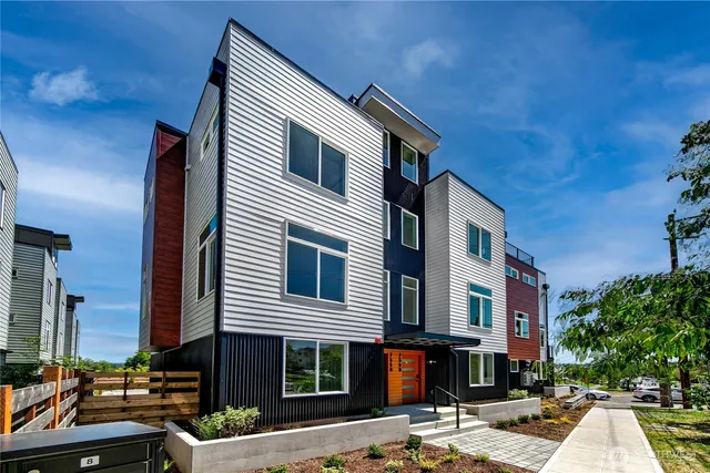 a front view of a house with street