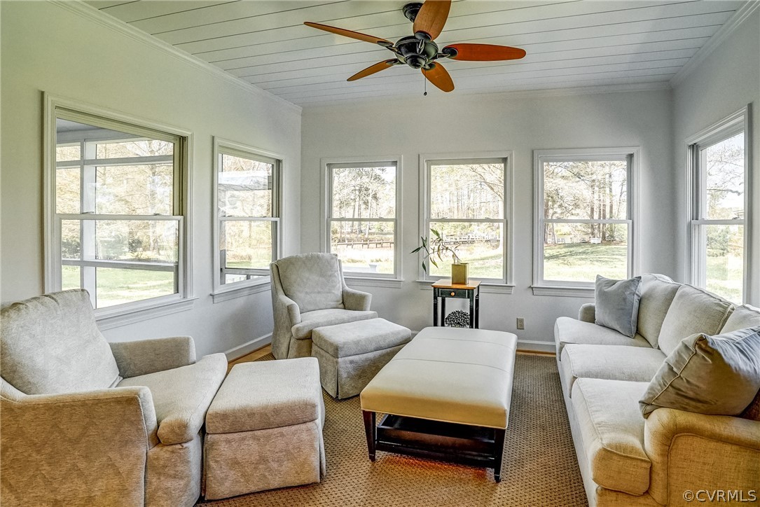 253 Prentice Point Drive Kilmarnock, VA 22482 - Photo 19 of 44 a living room with furniture and a large window