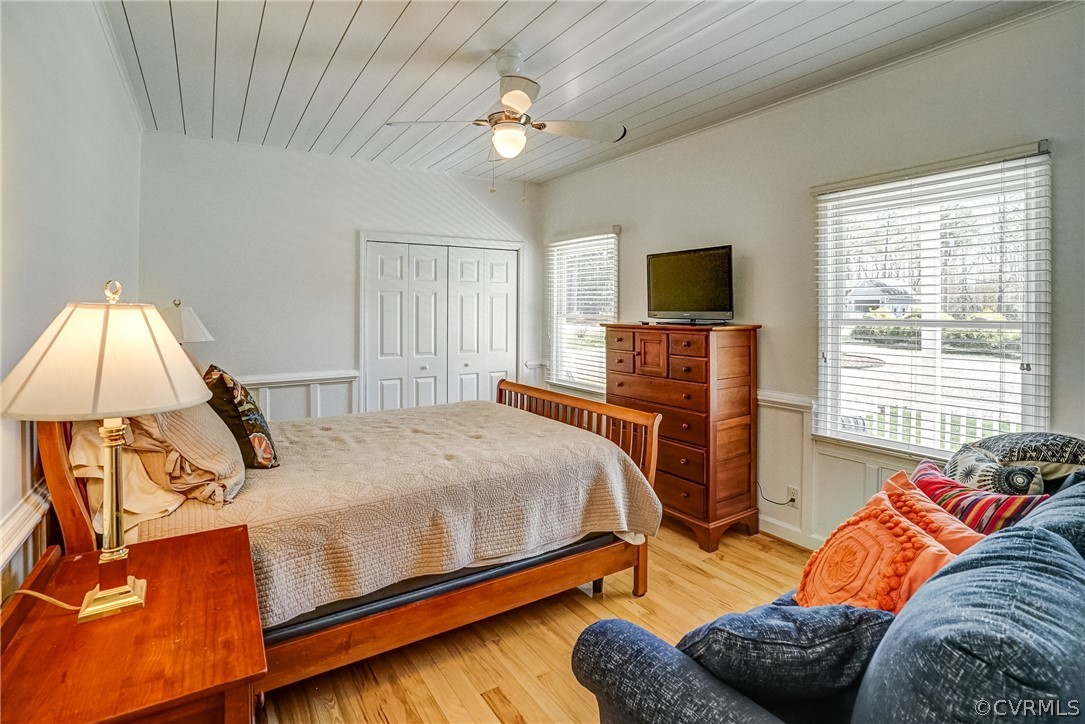 253 Prentice Point Drive Kilmarnock, VA 22482 - Photo 25 of 44 a bedroom with a bed and a flat screen tv