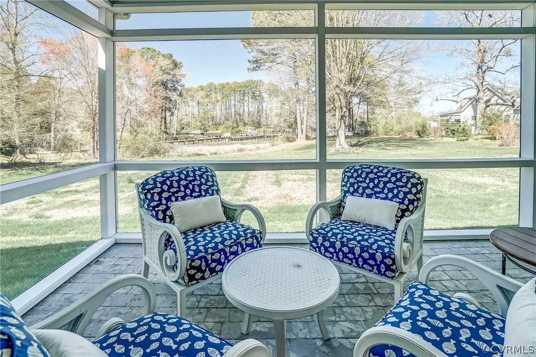 253 Prentice Point Drive Kilmarnock, VA 22482 - Photo 31 of 44 a outdoor dining space with furniture and outdoor view