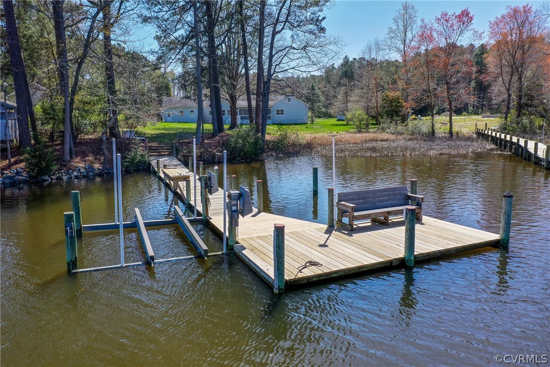 253 Prentice Point Drive Kilmarnock, VA 22482 - Photo 36 of 44 a balcony view with a seating space