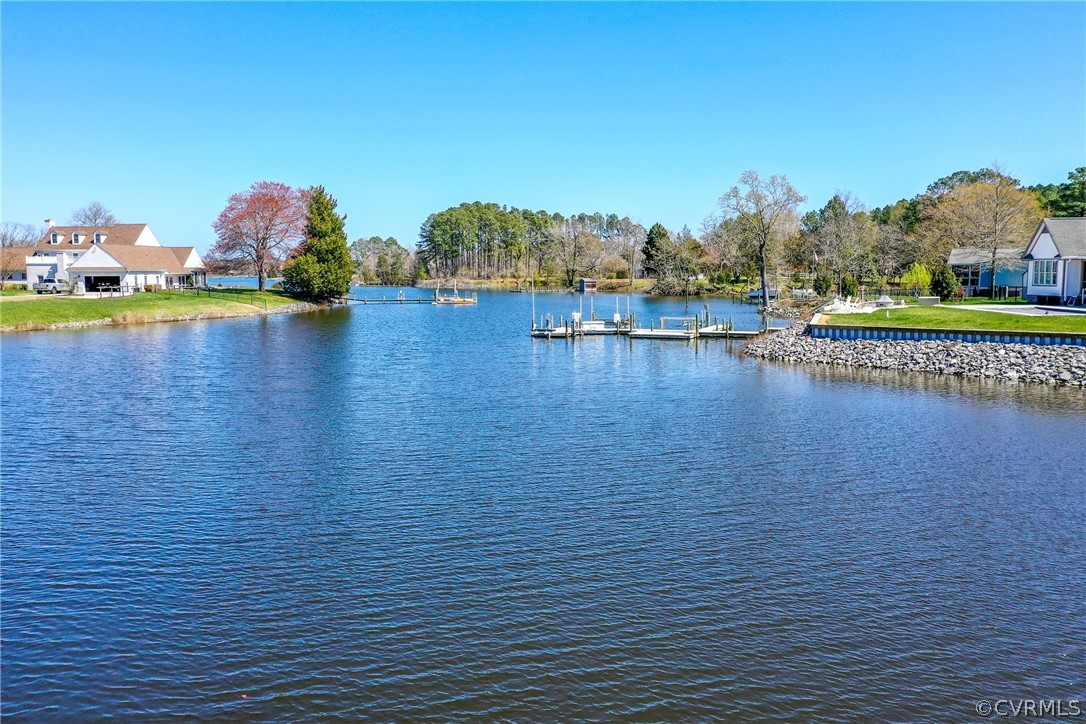 253 Prentice Point Drive Kilmarnock, VA 22482 - Photo 37 of 44 a view of a lake with houses