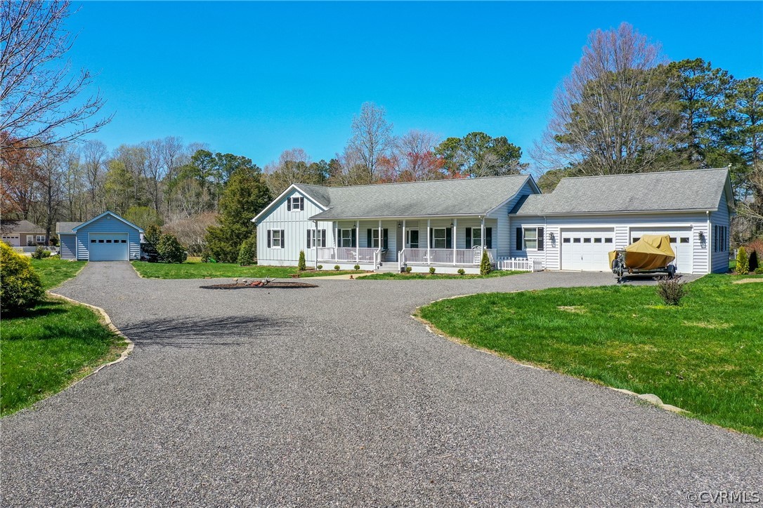 253 Prentice Point Drive Kilmarnock, VA 22482 - Photo 4 of 44 a view of multiple houses with a yard