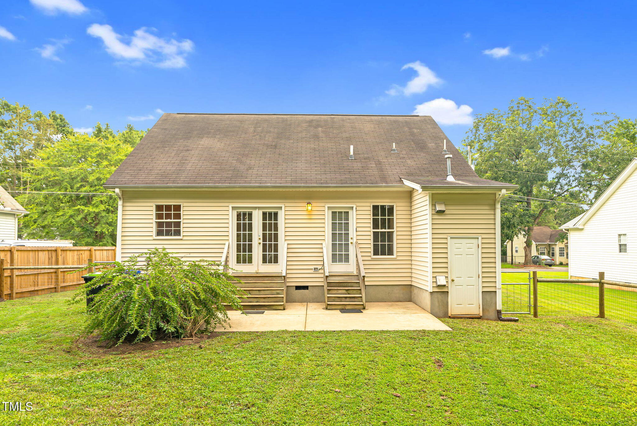 243 Toomer Loop Road Pittsboro, NC 27312 - Photo 13 of 42 a view of a house with a backyard