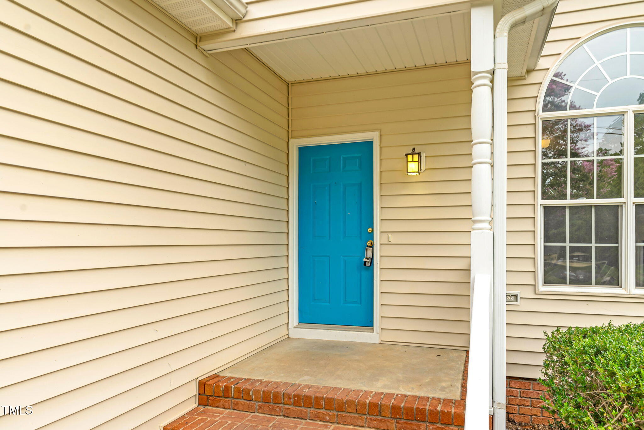 243 Toomer Loop Road Pittsboro, NC 27312 - Photo 18 of 42 a view of a house with a door and wooden floor