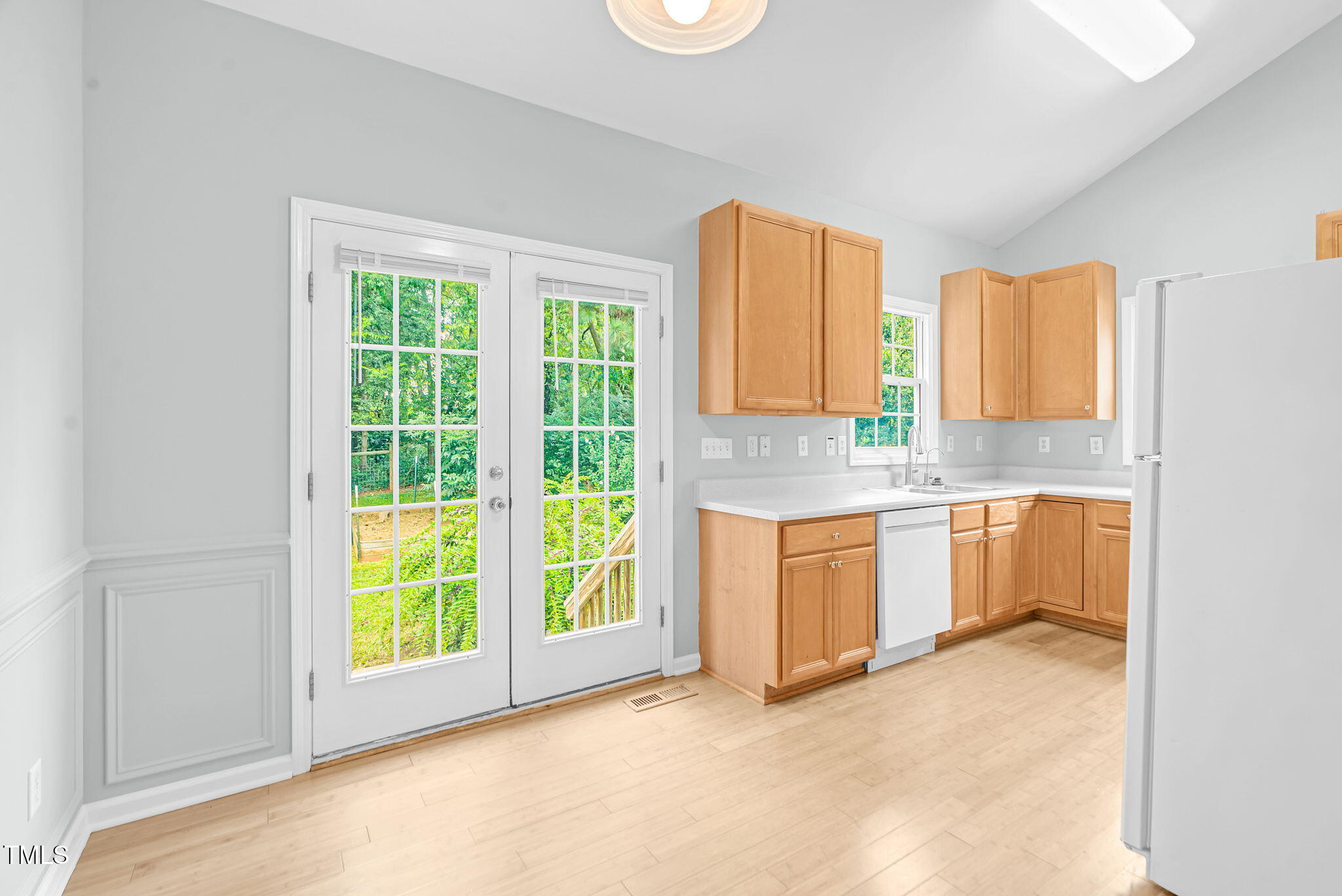 243 Toomer Loop Road Pittsboro, NC 27312 - Photo 21 of 42 a view of a kitchen with a sink and a window