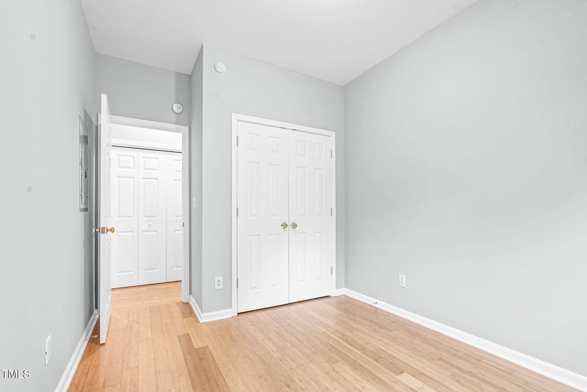 243 Toomer Loop Road Pittsboro, NC 27312 - Photo 29 of 42 a view of an empty room and wooden floor