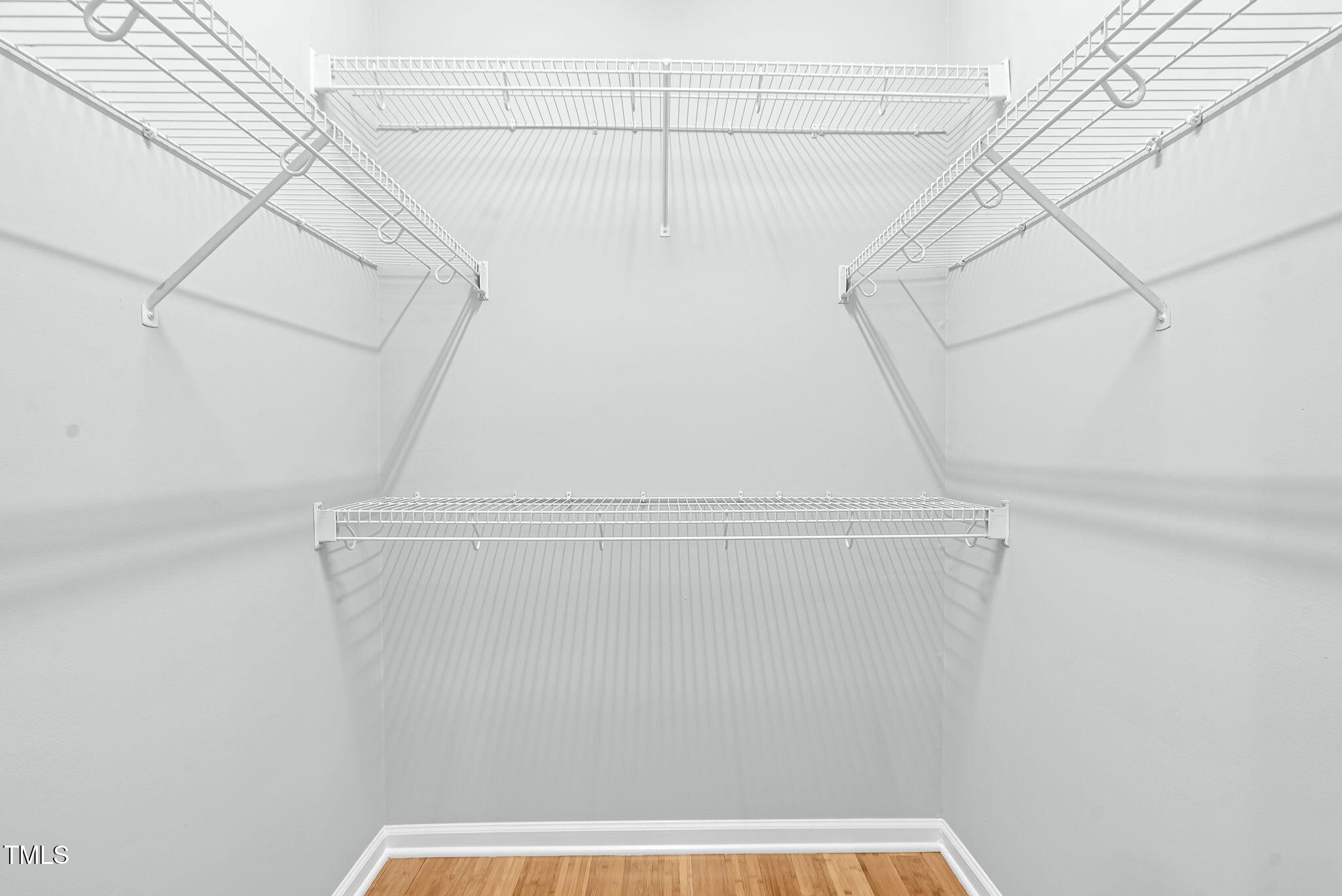 243 Toomer Loop Road Pittsboro, NC 27312 - Photo 34 of 42 a view of a room with racks on the wall