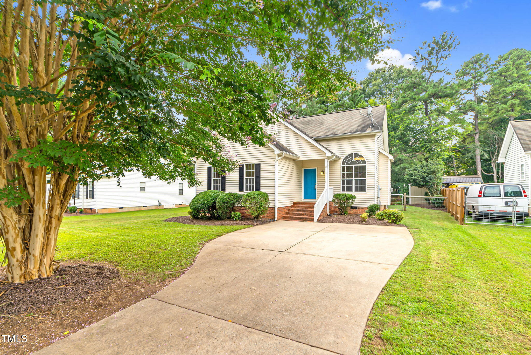 243 Toomer Loop Road Pittsboro, NC 27312 - Photo 4 of 42 a view of a house with swimming pool and a yard