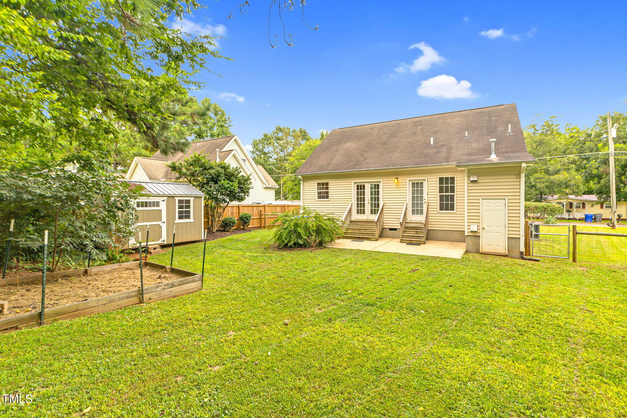 243 Toomer Loop Road Pittsboro, NC 27312 - Photo 5 of 42 a view of a house with pool and a yard