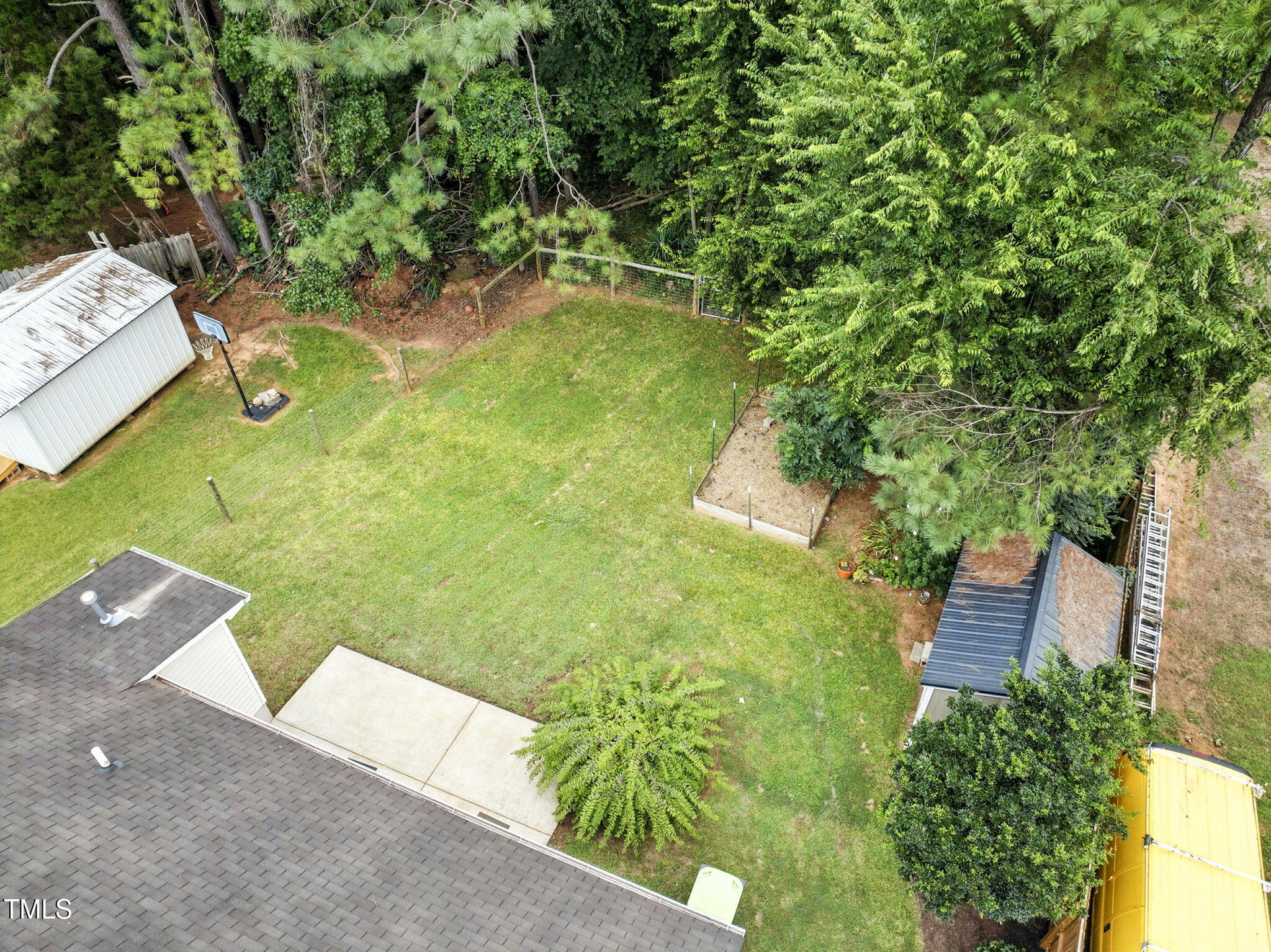 243 Toomer Loop Road Pittsboro, NC 27312 - Photo 7 of 42 an aerial view of residential house with an outdoor space